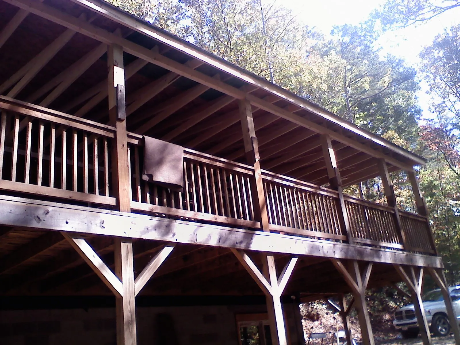 Timber framing under a new elevated porch and deck — Roof Leak Repair in Russellville by Roofing Brothers